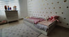 Cama montessori de madera para niño y niña en color blanco