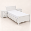 Cama-Cuna Trineo convertida en cama individual blanca con dos burós laterales y cajones integrados