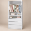 Ropero Vertical M750 blanco organizado con ropa y accesorios de bebé